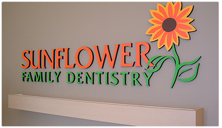 Sunflower dentistry logo